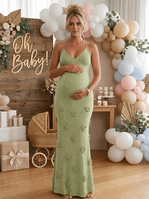 Sage green shimmer knit maternity maxi dress with 3D flowers, cami straps and tie back, designed for maternity photoshoot.