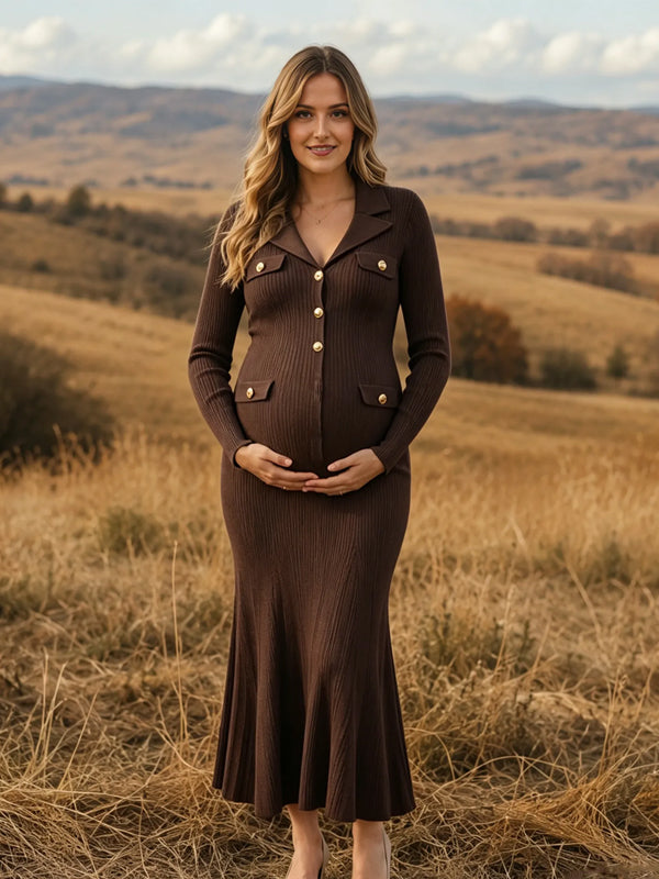 Brown ribbed knit maternity maxi dress with turndown collar, gold buttons and flared hem, designed for maternity photoshoot.