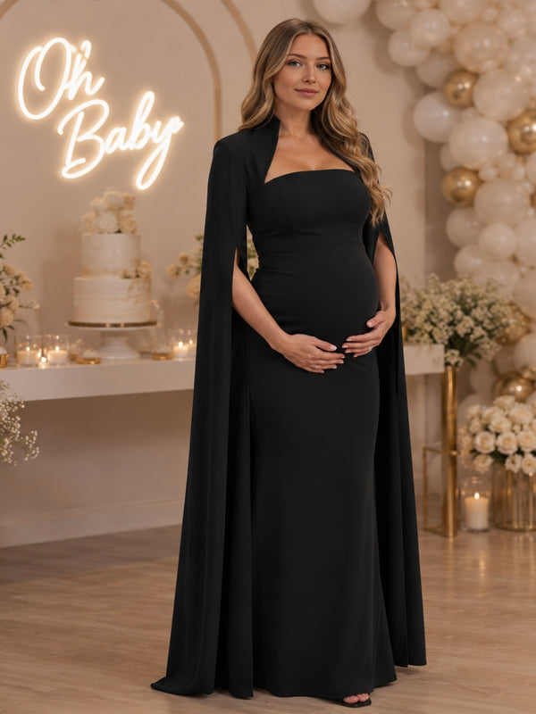 Black strapless mermaid maternity maxi dress with long slit-sleeve cape jacket, designed for baby shower.