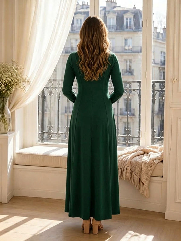 Back view of emerald green maternity shirt maxi dress with collar, button placket, long sleeves and A-line skirt, designed for everyday wear.