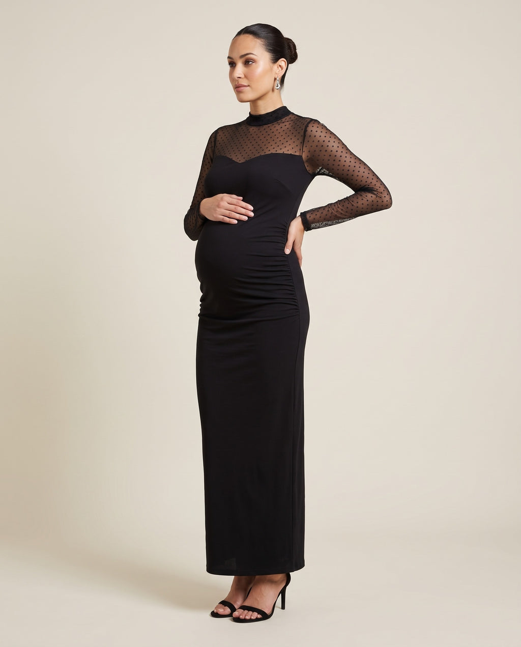 Black maternity maxi dress with dotted mesh yoke and sweetheart neckline, designed for baby showers.