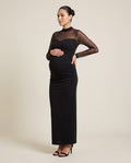 Black maternity maxi dress with dotted mesh yoke and sweetheart neckline, designed for baby showers.
