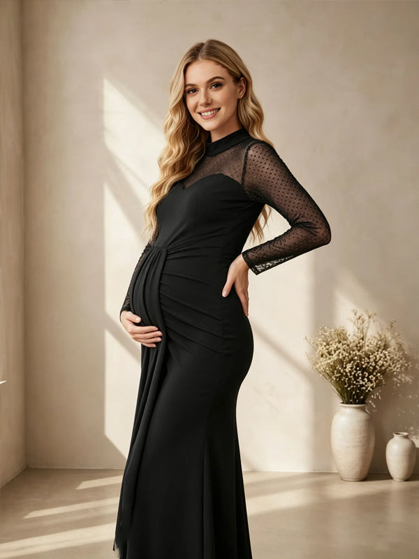 Side view of black maternity maxi dress with sheer dot mesh yoke and sleeves, sweetheart bodice and ruched fitted skirt, designed for baby shower.