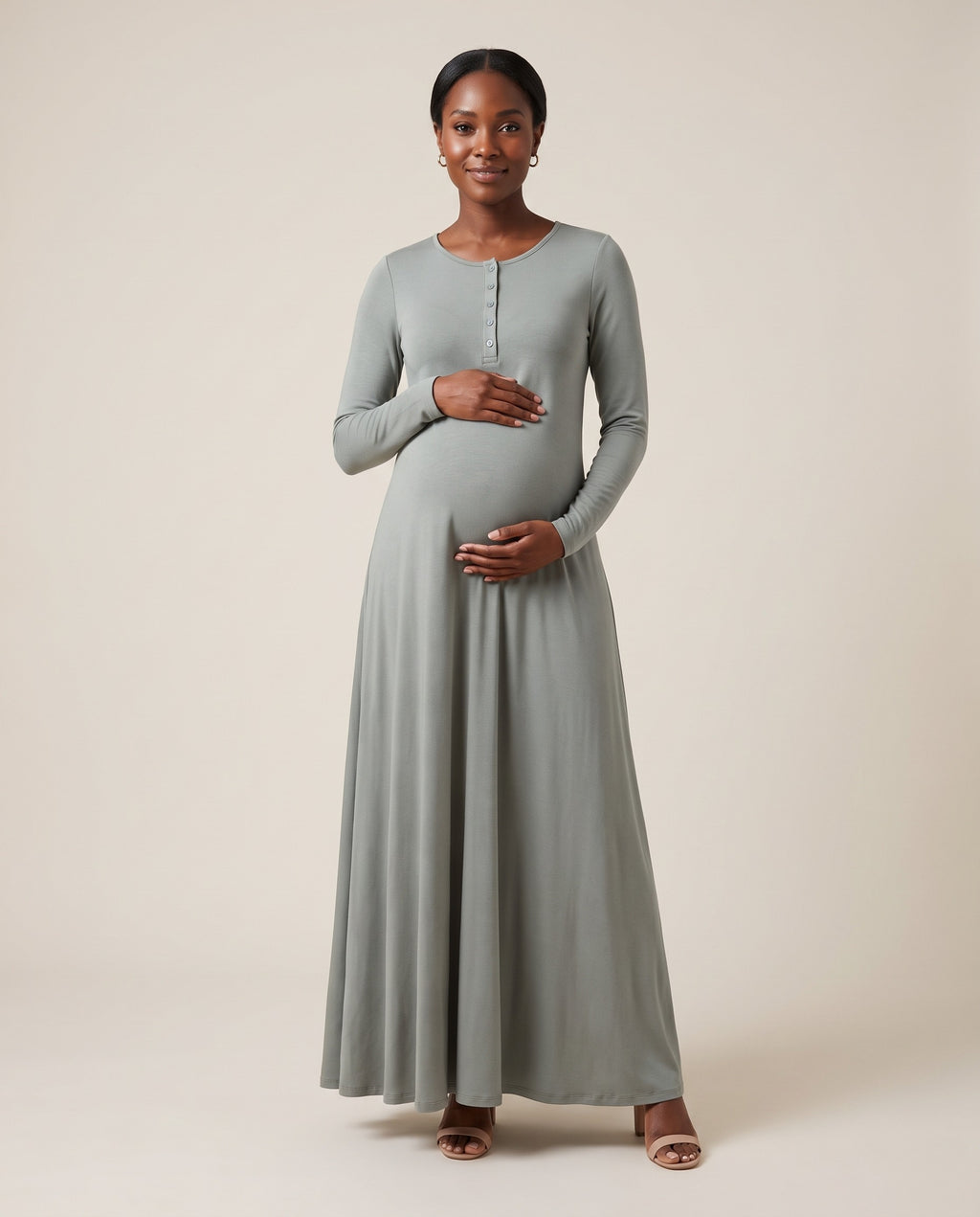 Grey jersey maternity maxi dress with henley button placket and flowing skirt, designed for outdoor maternity photoshoots.