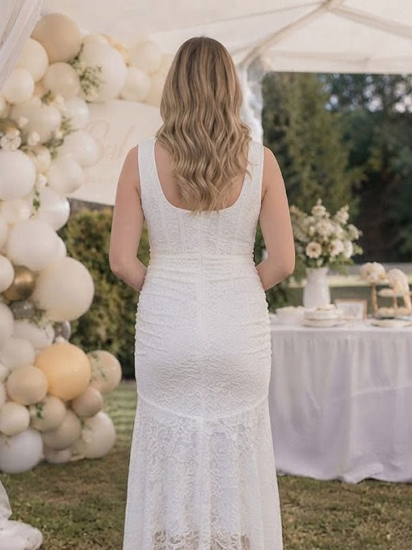 Back view of ivory lace maternity maxi dress with square neck, ruched bodice and high-low ruffle mermaid hem, designed for baby shower.