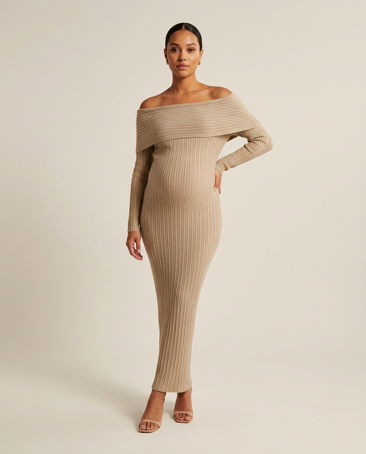 Khaki ribbed knit maternity maxi dress with fold-over off-shoulder neckline and long sleeves, shown on a pregnant model in studio.