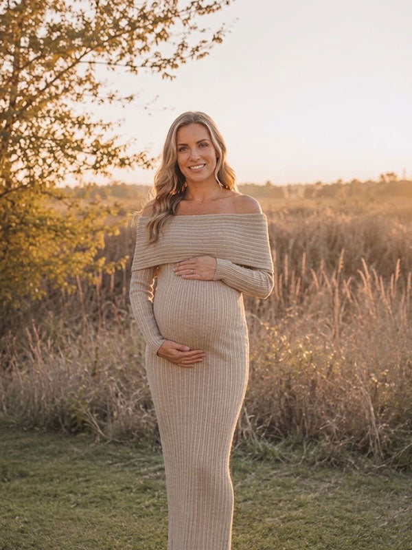 Khaki ribbed knit maternity maxi dress with fold-over off-shoulder neckline and long sleeves, designed for maternity photoshoot.