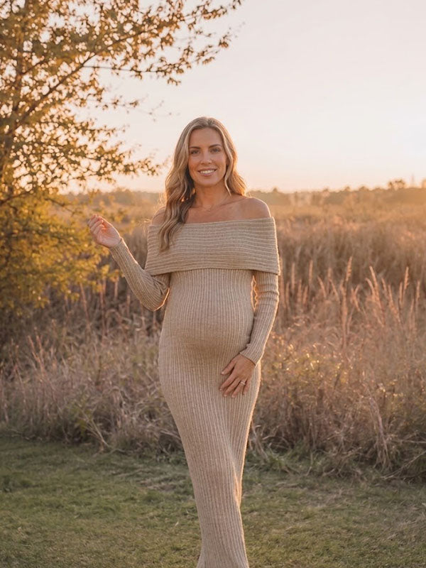 Khaki ribbed knit maternity maxi dress with bodycon fit and off-shoulder neckline, designed for maternity photoshoot.