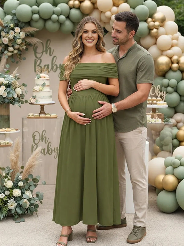 Olive green maternity maxi dress with ruched off-shoulder neckline, smocked high waist and flowy skirt, designed for baby shower.