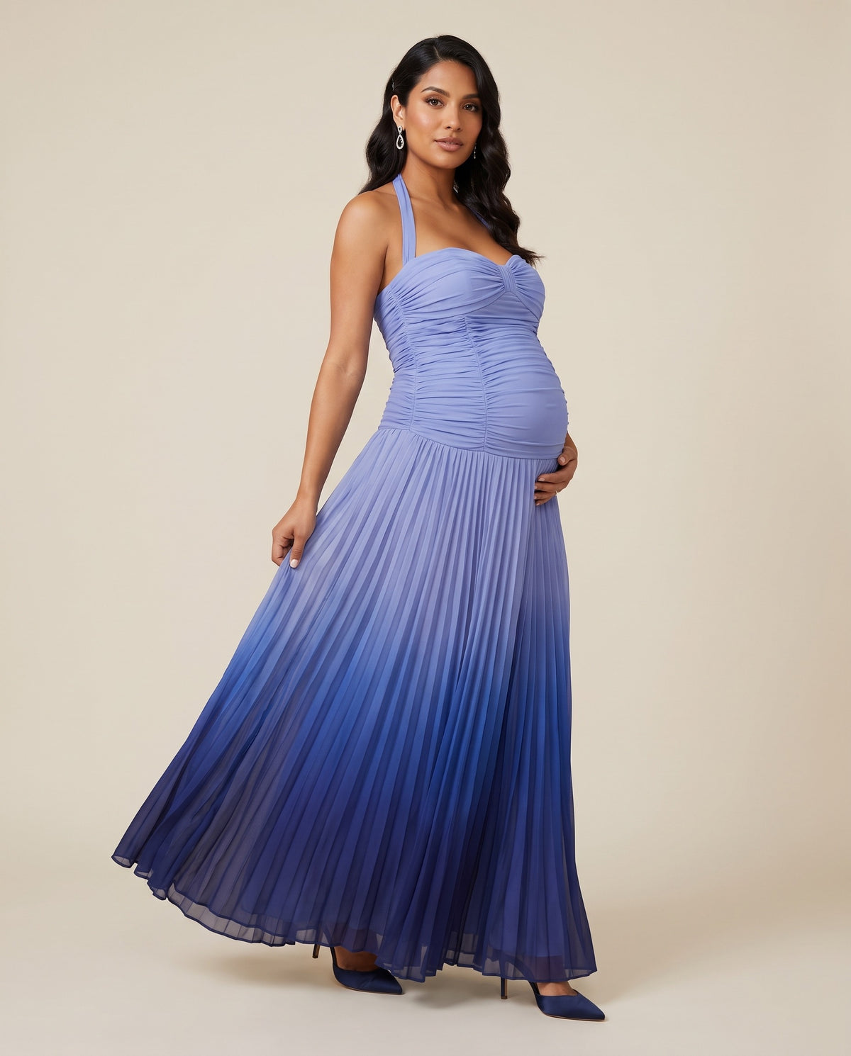 Blue ombre pleated maternity maxi dress with halter neckline, designed for maternity photoshoots and formal events.