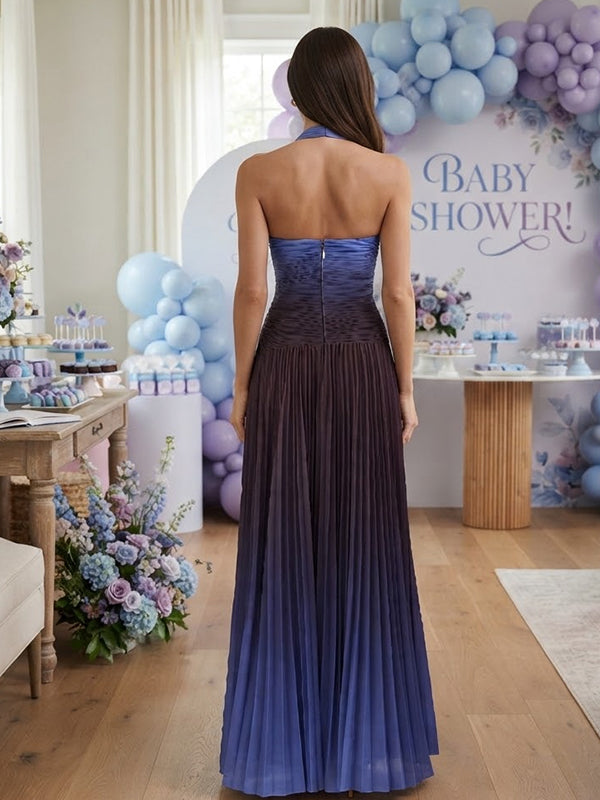 Back view of blue ombre pleated chiffon maternity maxi dress with ruched halter sweetheart bodice and open back, designed for baby shower.