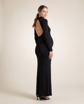 Black jersey maternity maxi dress with mock neck and open back, designed for evening and photoshoot wear.