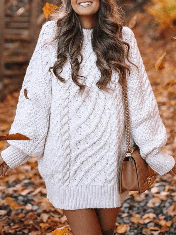 Cream white oversized cable knit maternity mini sweater dress with crew neck and balloon sleeves, designed for everyday wear.