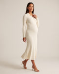 Ivory ribbed knit maternity midi dress with polo collar and button placket, designed for everyday and baby shower wear.