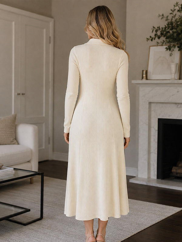 Back view of ivory ribbed knit maternity midi dress with polo collar, button placket and flared hem, designed for maternity photoshoot.