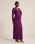 Purple ruched maternity maxi dress with gold star buttons and long sleeves, designed for wedding guest wear.