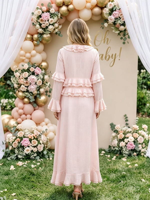 Back view of light pink chiffon maternity maxi dress with ruffled V-neck, tiered ruffle bell sleeves and high-low ruffle hem, designed for baby shower.