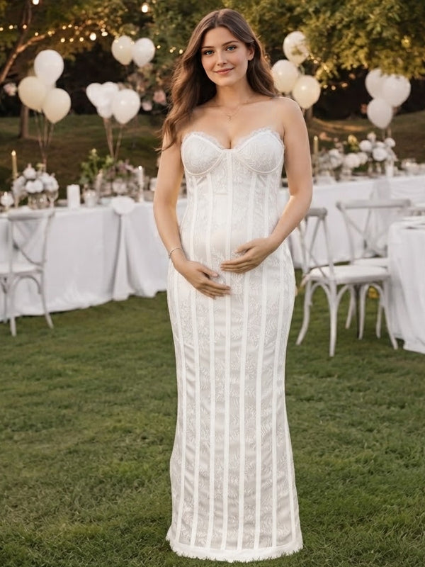 White strapless lace maternity maxi dress with sweetheart corset bodice and lace-up back, designed for baby shower.