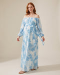 Blue tie-dye chiffon off-shoulder maternity maxi dress with sash, designed for beach photoshoots.