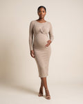 Beige ribbed knit maternity midi dress with twist front detail, designed for baby shower and everyday wear.