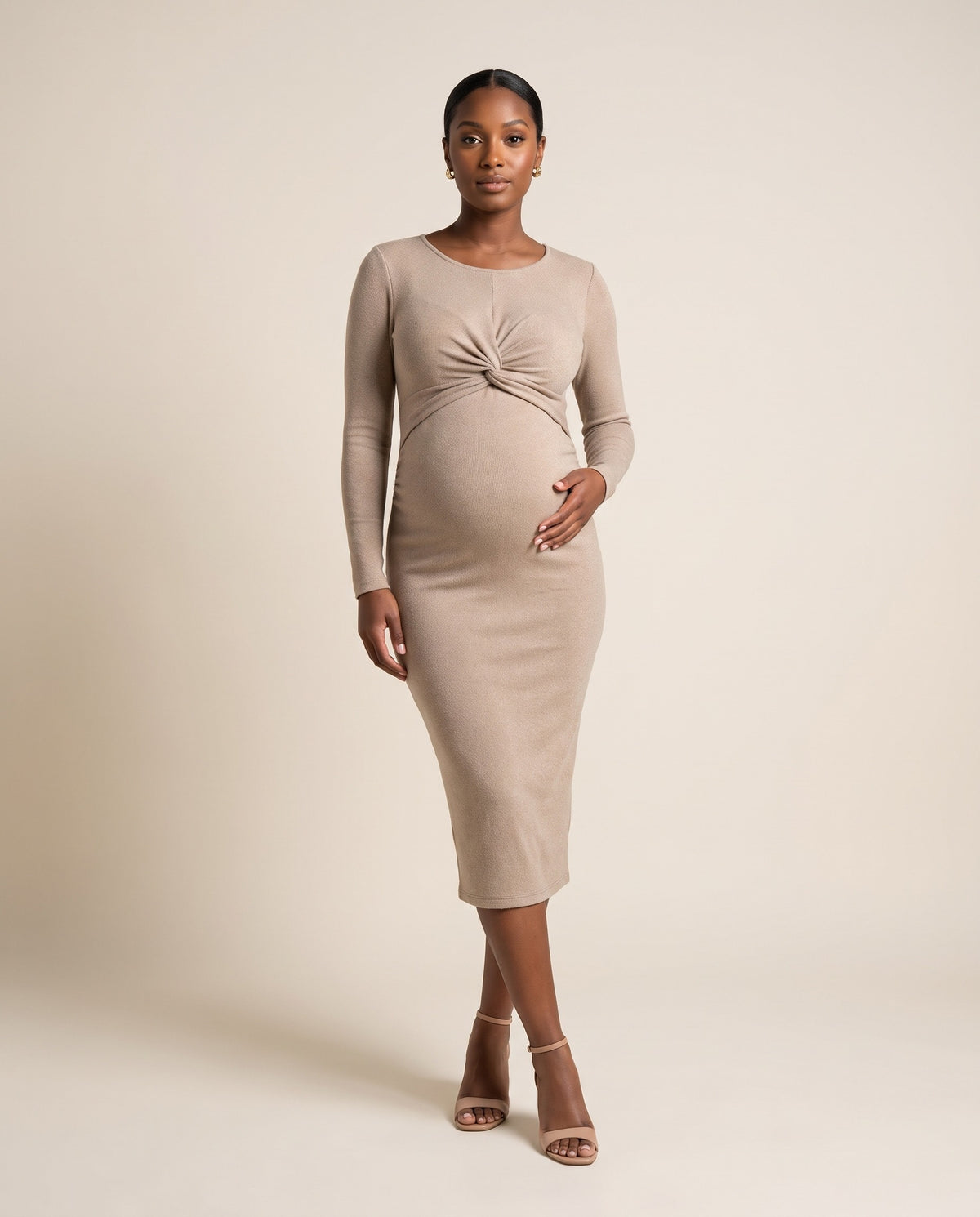 Beige ribbed knit maternity midi dress with twist front detail, designed for baby shower and everyday wear.
